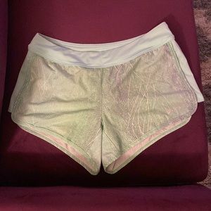 Asics workout shorts, size M. Gently used. Nice pocket in the back.